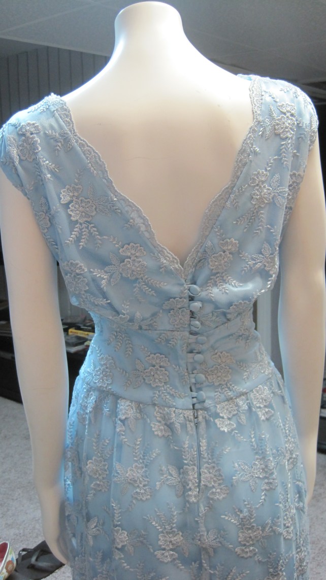 Scalloped v-back and covered buttons