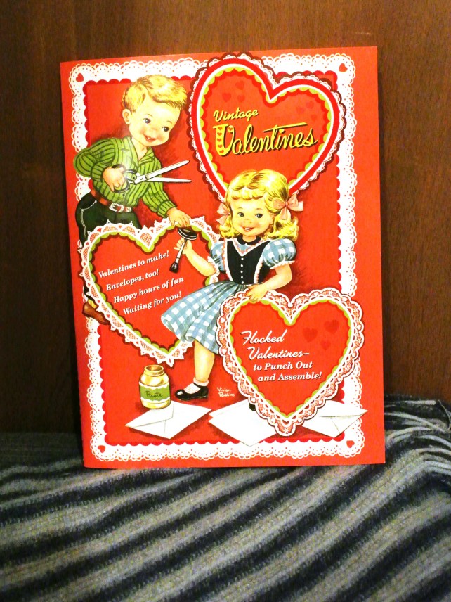 I found this at London Drugs the other night: it's an old fashioned punch-out valentines day card book!  I remember giving these to my classmates in elementary school.