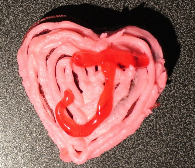 I made a little heart-shaped red velvet cake for my sweetheart today.