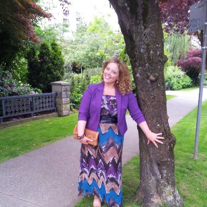 PS-Here's how I wore the dress a couple of years ago to the screening of MisRepresentation: With a navy obi belt, purple blazer and sandals.  And blonde hair!!!