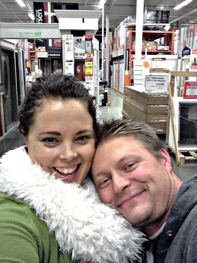 We have a cozy moment in the home depot, and Jeff actually fits his top part in the frame.  My scarf doubles as a blanky-pillow.