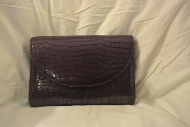 Purple mock croc clutch.