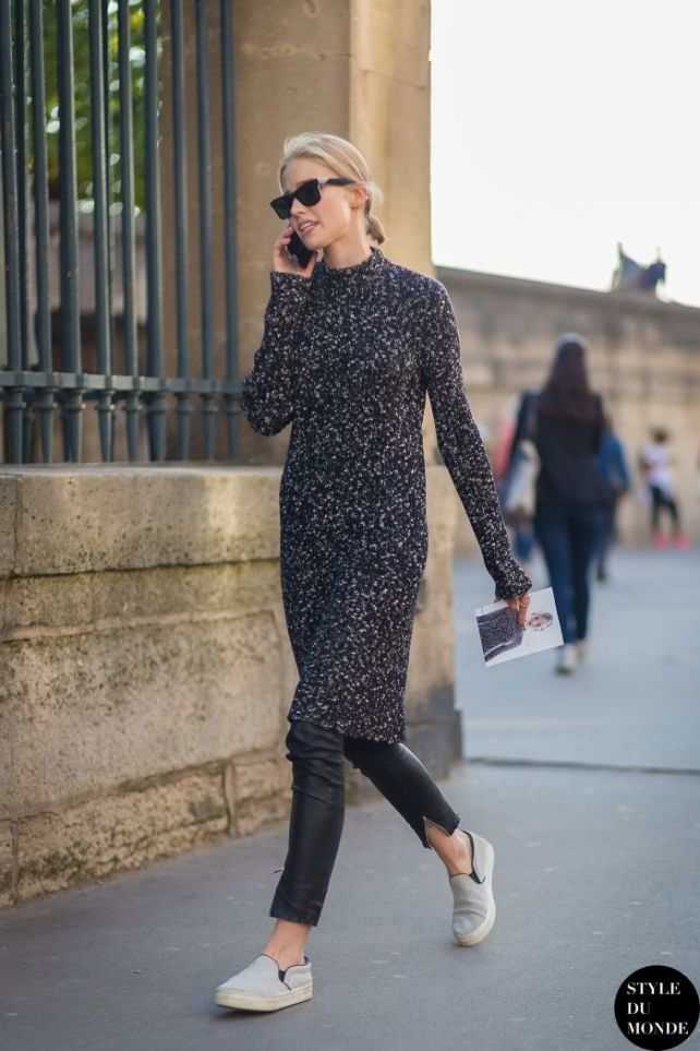 Casual: Sweater dress over vegan leather pants and sneakers