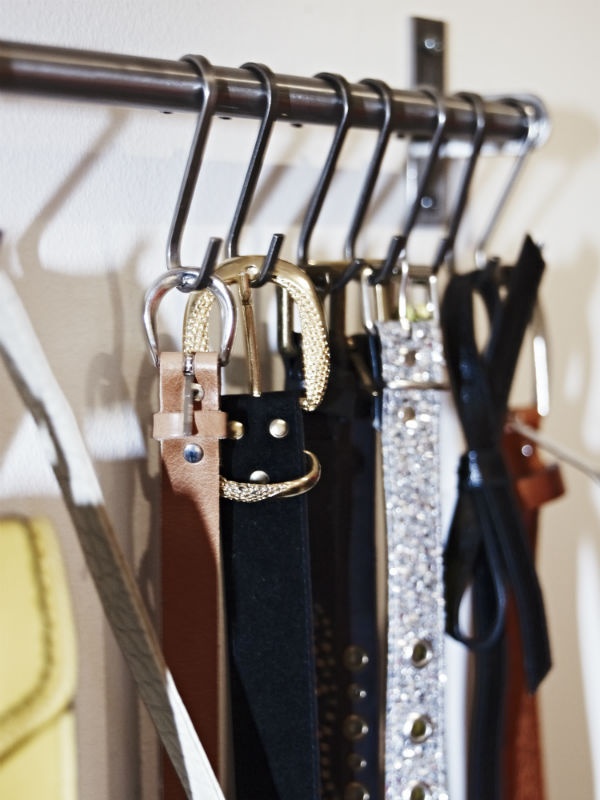 BELTS, because I featured them yesterday.  Use a curtain rod and s-shaped hooks to keep your belts handy and visible in your closet or bedroom.