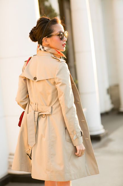 Petite trench!  The belt hits her at the waist, making this coat perfectly proportionate.
