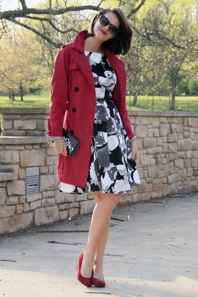 Red trench tops a neutral dress.