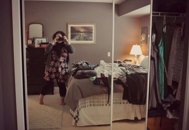 Chrissy goes to the washroom to change into a dress she's unsure about, and I seize the moment with a mirror selfie.