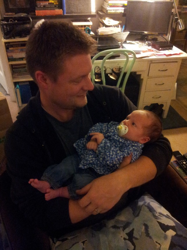 Bonus Picture: Jeff holding Baby Edith, our niece.  A natural, isn't he?